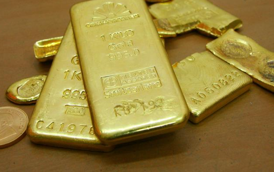 Gold falls as yields, dollar firm ahead of U.S. inflation data