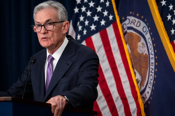 The U.S. dollar minimizes losses subsequent to the Federal Reserve's minutes warning against premature reductions in interest rates.